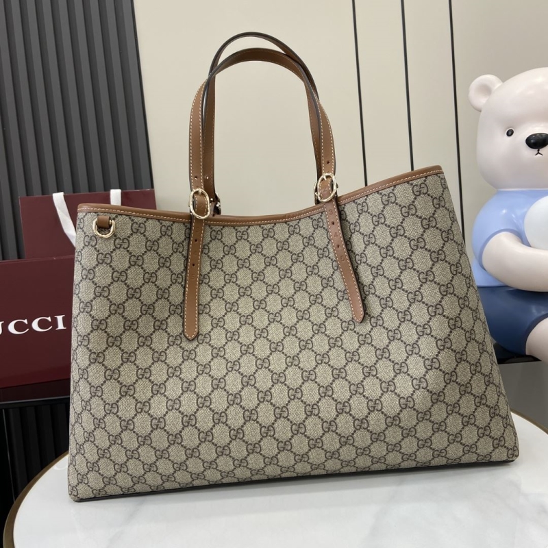 G*u*i shopping bags